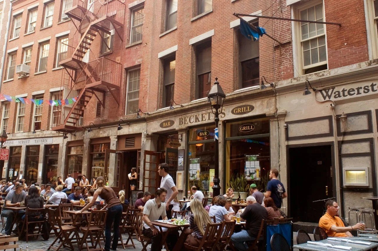 The cobblestoned Stone Street Historic District lined with bars and restaurants